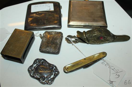 Victorian silver vesta case, 2 silver cigarette cases, brass swan head paper clip and a mother of pearl handle penknife